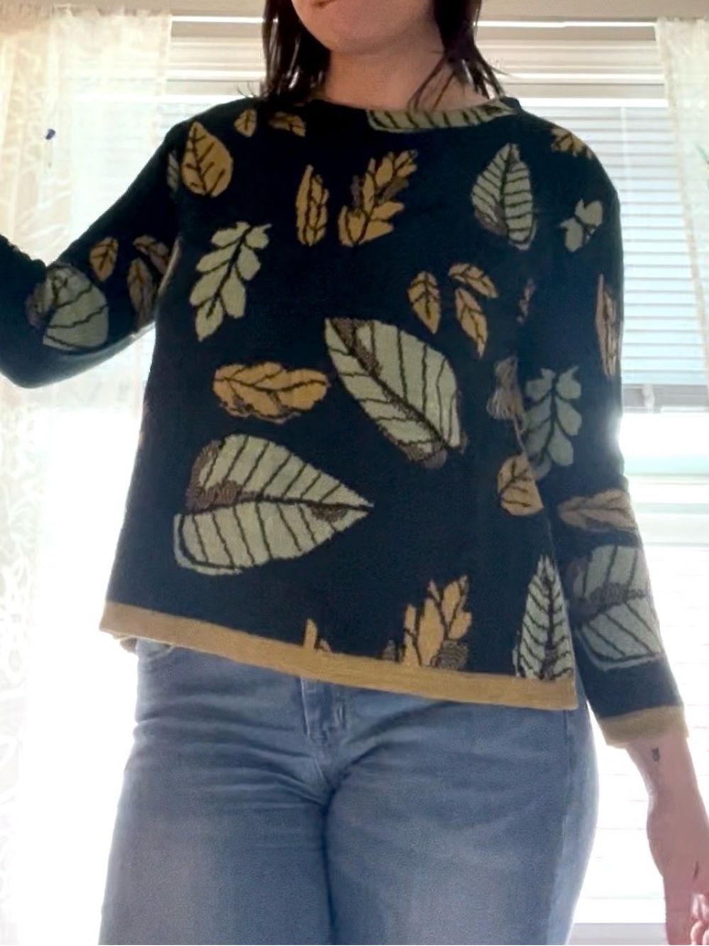 Green leaf motif sweater